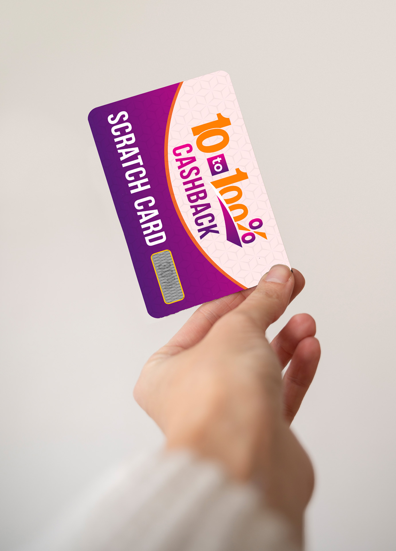 Scratch cards - hand holding a scratch gift card