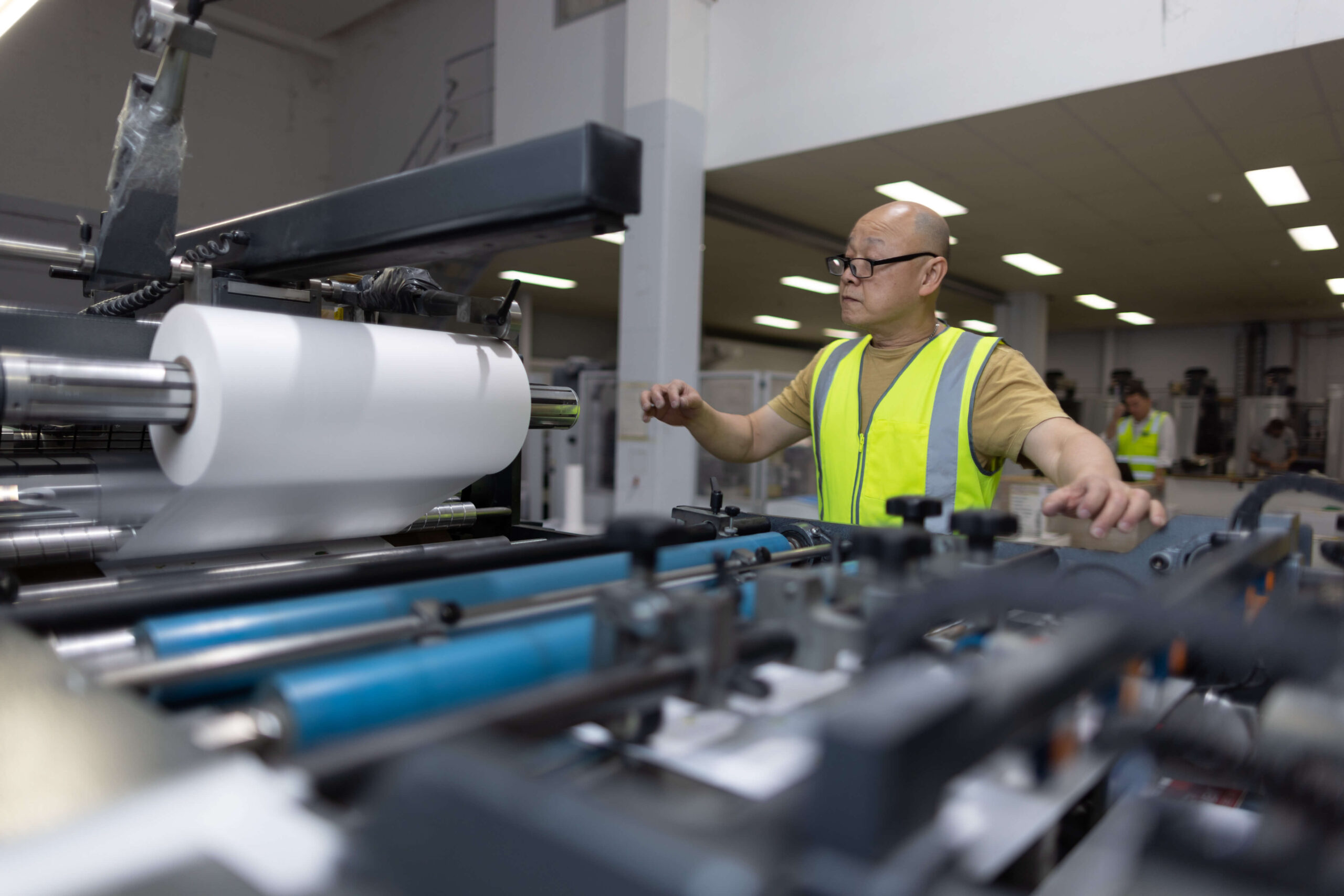 https://www.clarkemurphyprint.com.au/wp-content/uploads/2025/04/Our-Services_R5_1481_Lamination-1-scaled.jpg